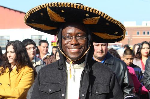 Father Joseph Archibong, an associate pastor at St. Joseph Church in Conway, dons a sombrero for the Dec. 15 procession. 