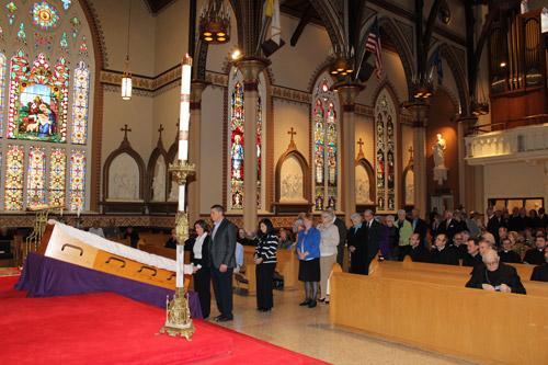 A line of Catholic faithful stretches the length of the cathedral sanctuary prior to the rosary April 7. Following the rosary, an all-night vigil was held while Bishop McDonald lay in state. Dwain Hebda photo
