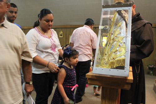 Parishioners of all ages attended Masses featuring the statue, many of which were accompanied by rosaries, confession and other Catholic ministries. Dwain Hebda photo