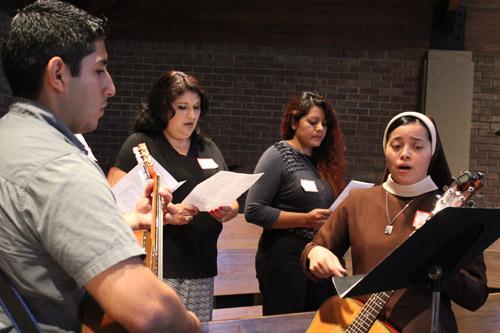 Sister Rosa Elena Perez, CMST, leads the music with members of St. Joseph Church choir members. Dwain Hebda photo