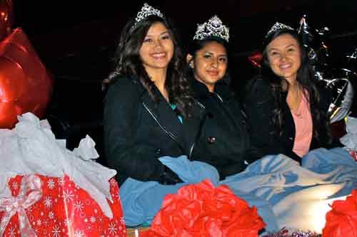 Daisy Avarrado (left), Natalie Azanza and Diana Cortes were selected as Our Lady of Guadalupe Queens for St. Vincent de Paul Parish’s annual proces-sion in Rogers Dec. 11. (Photo by Alesia Schaefer)