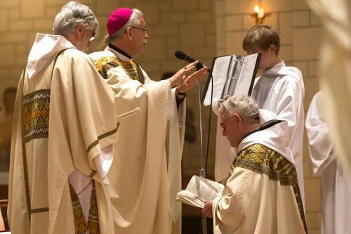 Bishop Taylor blesses Abbot Leonard during the first abbatial blessing in 25 years. (Karen Schwartz)