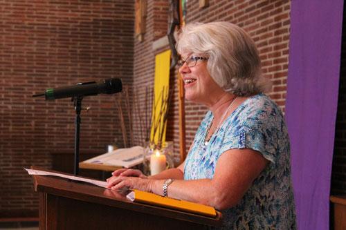 Cackie Upchurch, LRSS director, welcomes 125 attendees to day two of the 2015 Bible Institute. The 25th annual event was held June 19 -21 at St. John Center in Little Rock. (Dwain Hebda photo)