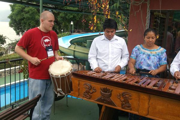 Seminarian Deacon Martin Siebold joins local musicians at a welcome reception at Hotel Don Rodrigo in Panajachel.