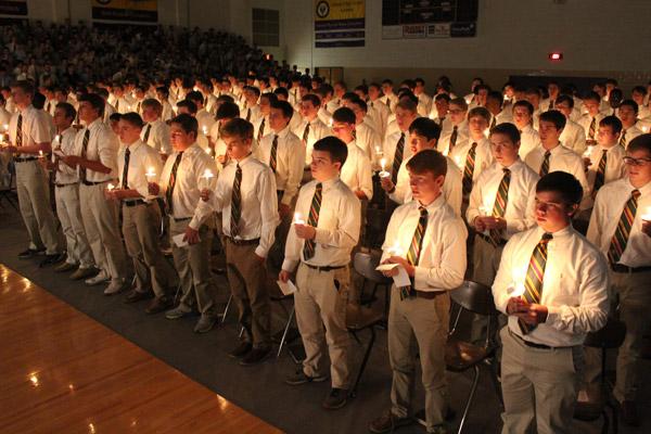The senior class receives a final blessing prior to the singing of the Alma Mater Sept. 14. (Dwain Hebda photo)