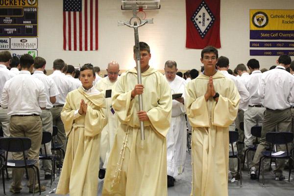 Altar servers process out at the end of the Ring Mass. (Dwain Hebda photo) 