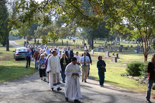 Catholics pray the rosary Nov. 2 for the faithful departed following the annual All Souls Day Mass. (Aprille Hanson photo)