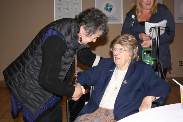 Alice Stuff, parishioner at Our Lady of the Holy Souls Church in Little Rock, greets Sister Margaret. Stuff, who volunteered in guest relations at St. Vincent, called Sister Margaret “one of the finest people you will ever know.” (Aprille Hanson photo)