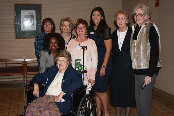 Sister Margaret smiles with some of her volunteers from St. Vincent guest relations at her retirement reception Jan. 4. (Aprille Hanson photo)