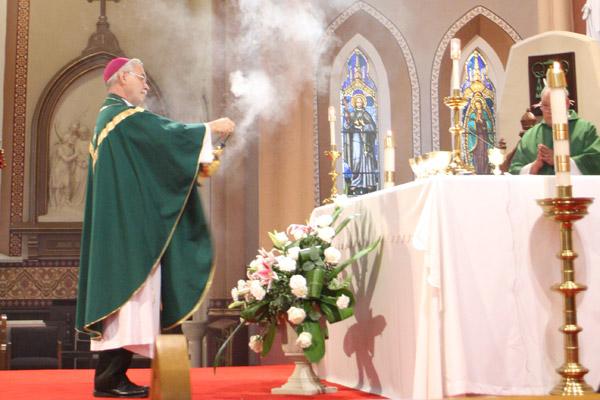 Bishop Anthony B. Taylor incenses the altar at the Cathedral of St. Andrew at the start of the Mass for Life. (Malea Hargett photo)