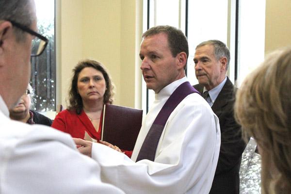 Father Erik Pohlmeier gives last minute instructions to the assembled Directors of Religious Education before the Rite of Election at Christ the King Church in Little Rock March 5. (Dwain Hebda photo)
