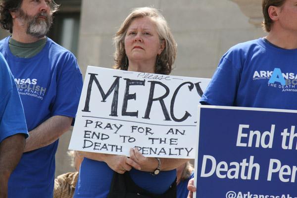 Execution protesters at the state capitol April 14 asked Gov. Asa Hutchinson to show mercy for those on death row, especially those scheduled to be executed in April. (Malea Hargett photo)  