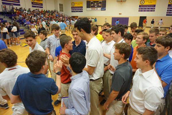 Catholic High seniors congratulate Aubrey Volpert after the signing day ceremony. (Aprille Hanson photo)