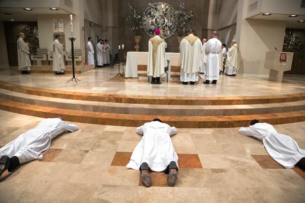 During the Litany of Supplication the elect lay prostrate before the altar, in an act of surrender to God. (Bob Ocken photo)