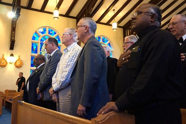 Faith leaders throughout the Hot Springs community gathered to pray for first responders Sept. 11, including Father Chinnaiah Irudayaraj “Y.C.” Yeddanapalli, pastor at St. John Church (right). (Aprille Hanson photo)