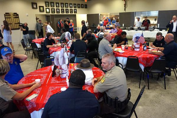 First responders were treated to a free breakfast from 6 a.m. to 9 a.m. Sept. 11 at St. Mary's parish hall. About 300 people attended with more than 100 stopping by for carry-out meals. (Aprille Hanson photo)