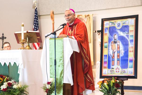 Bishop Anthony B. Taylor delivers his homily at Blessed Stanley Rother Mission during a Sept. 24 Mass at the local elementary school. (Travis McAfee photo)