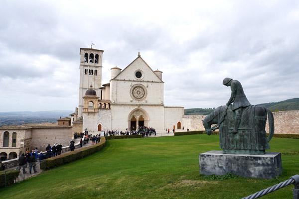 In Assisi on Oct. 29, the pilgrims had Mass at the Basilica of St. Francis (right), where St. Francis’ crypt is located. The group also toured the Church of St. Mary of the Angels, which houses the little chapel where the Franciscan order was born and where St. Francis consecrated St. Clare. The San Damiano Cross that spoke to St. Francis in 1205 was viewed at the Church of St. Clare. (Malea Hargett photo)