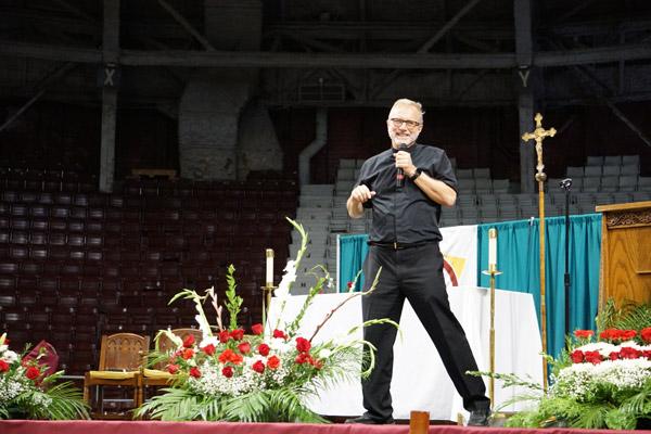 Msgr. Scott Friend, the diocese's vicar general and vocations director, was one of the presenters before the Encuentro Mass Nov. 18 at Barton Coliseum in Little Rock. (Malea Hargett photo)