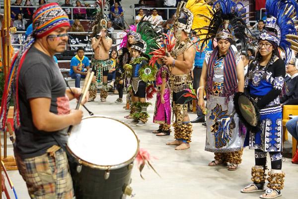 Aztec dancers from Hot Springs process in with a drummer before the presentation of the gifts. (Malea Hargett photo)