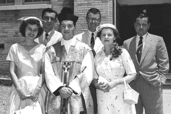 Father Joe Biltz stands with his family at his ordination to the priesthood in May 1955. He was the first priest ordained from Our Lady of the Holy Souls Church in Little Rock. (Courtesy Biltz family)