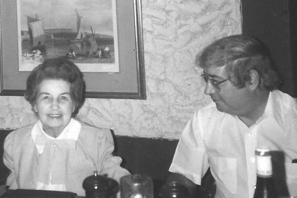 Father Joe Biltz (right) sits beside his mother, Hilda, at a gathering in Little Rock for her 84th birthday in 1984. (Courtesy Biltz family)
