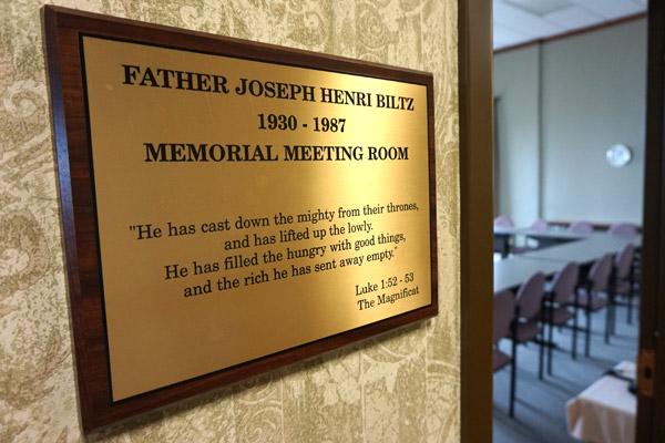 A meeting room named for Father Joe Biltz is on the fourth floor of Morris Hall at St. John Center. In it hangs memories of Father Biltz, including the posthumous 1988 Civil Libertarian of the Year Award from the ACLU of Arkansas. (Aprille Hanson photo)