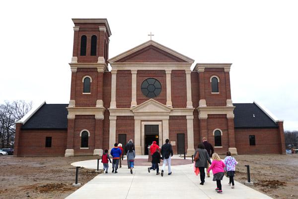 For about 19 years, the parish has been working toward building a larger church to fit a growing congregation. The Sunday Mass was the first time most parishioners got to see inside the new 15,000-square-foot building. (Aprille Hanson photo) 