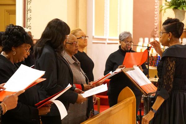The diocesan choir from St. Augustine Church in North Little Rock, St. Peter Church in Pine Bluff and St. Bartholomew Church in Little Rock lead the congregation in music. (Malea Hargett photo)
