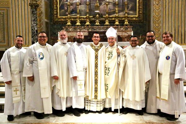 Father Amaro poses with Bishop Taylor and fellow Diocese of Little Rock priests who made the trip to Rome for his May 11 ordination. They are Father Stephen Gadberry (left), Father Juan Guido, vocations director Msgr. Scott Friend, Father Jeff Hebert, Father Juan Manjarrez, vocations spiritual formation advisor Father Rubén Quinteros and Father Martin Siebold. (Denis Nakkeeran photo, Pontifical North American College)