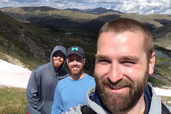 Then-seminarians Jeff Hebert, Patrick Friend (center) and Joseph Friend pause for a selfie while hiking Rocky Mountain National Park in July 2017. Even after life changed for Father Hebert and Father Patrick Friend with their 2018 ordination, they still enjoy hiking.