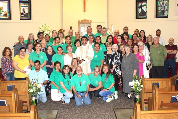 Family, friends and fellow St. James parishioners stand with Daniel Velasco after his diaconate ordination in Searcy May 17. (Dwain Hebda photo)
