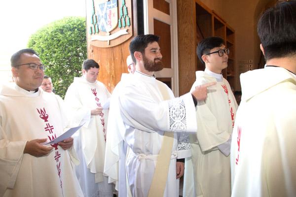 Jon Miskin processes into Mass with the deacons and priests during his May 25 ordination at the Cathedral of St. Andrew in Little Rock. (Bob Ocken photo)