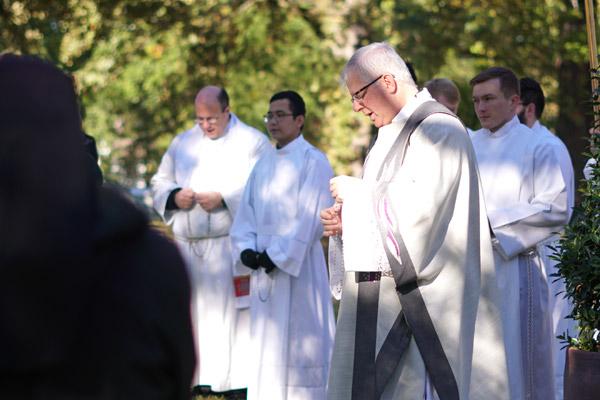 The procession concluded at Priests' Circle with a blessing of the graves. (Malea Hargett photo)
