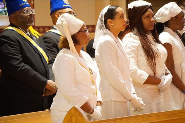Members of the Knights and Ladies of Peter Claver stand together during the Dr. Martin Luther King Jr. Memorial Mass Jan. 11 at the Cathedral of St. Andrew in Little Rock. (Malea Hargett photo) 