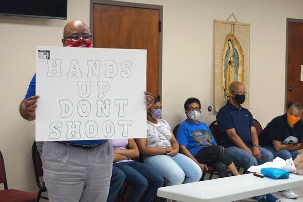The dialogue on racism surrounded common phrases like “Hands up, don’t shoot,” held here by a Diocesan Council for Black Catholics member. The listening session was held at the House of Formation in Little Rock on July 2. (Aprille Hanson photo)