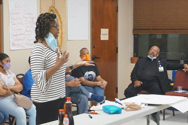 Alma Stewart, DCBC member and parishioner at St. Bartholomew Church in Little Rock, shares a story regarding racism she experienced as a child. Members of the council were encouraged to share their stories. (Aprille Hanson photo)