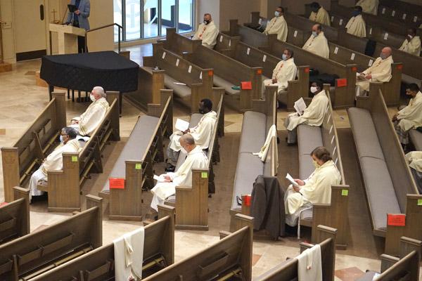 The Chrism/Jubilarian Mass was closed to the public but livestreamed Aug. 10. Priests from across the diocese attended, sitting distanced and with masks amid the COVID-19 pandemic. (Aprille Hanson photo)
