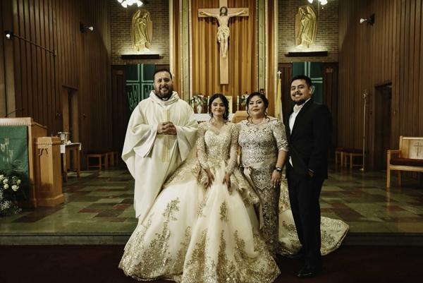 Ivela Garcia, a sophomore at Mount St. Mary Academy in Little Rock, poses with Father Victor Rubén Quinteros; her mother, Maria, and brother, Gerardo, after her quinceañera Mass at St. Mary Church Church in North Little Rock July 10. (Photo Yaz Jimenez/Jimenez Imagery)