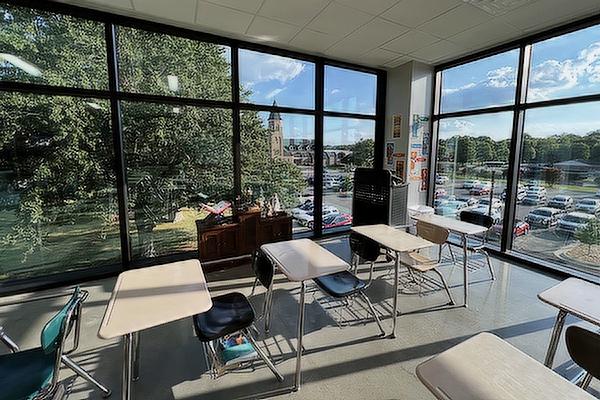Walls of windows in the new $9.5 million, 39,000-square-foot St. Joseph High School in Conway allow natural light to flood the building's classrooms.
