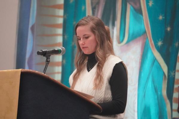 Tarah Verkamp, an intern with Catholic Charities of Arkansas, gave the first reading during the annual Mass for Life in the Wally Allen Ballroom at the Statehouse Convention Center in Little Rock Jan. 22. (Malea Hargett photo)