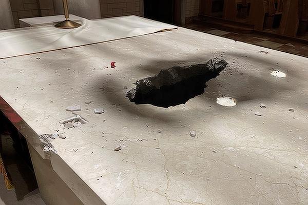 On the afternoon of Jan. 5, Jerrid Farnam allegedly smashed a large hole into the single-piece marble altar top  —  known as a mensa — containing two reliquaries at St. Benedict Church at Subiaco Abbey. (Courtesy Abbot Elijah Owens, OSB)