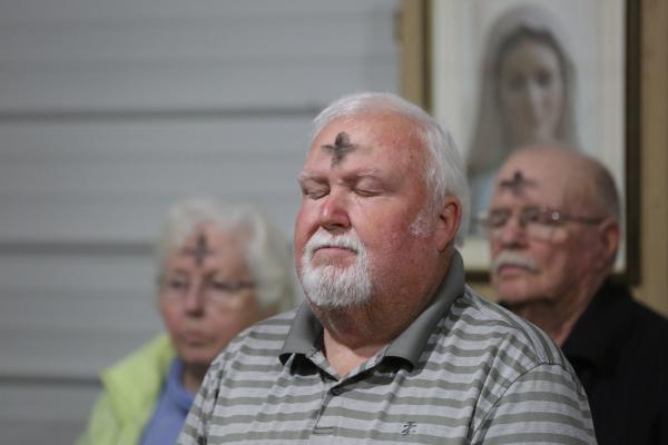 Parishioners of Resurrection Catholic Church in Dawson Springs, Ky., pray during Ash Wednesday Mass March 2, 2022. OSV News photo/CNS file, Bob Roller.