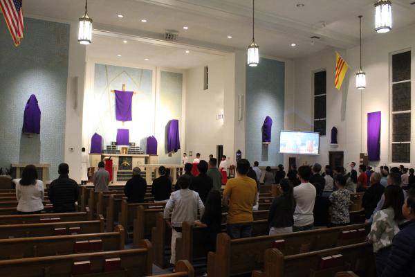 Parishioners gather for a Vietnamese Good Friday service at St. Patrick Church in North Little Rock March 29. (Katie Zakrzewski)