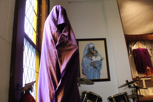 A statue of the Virgin Mary is covered in the purple Lenten cloth to mark the beginning of Holy Week at St. Bartholomew Church in Little Rock March 24. (Katie Zakrzewski)