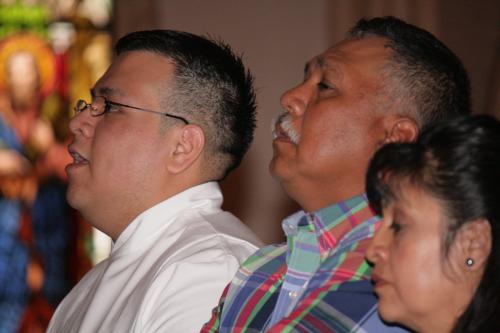 Deacon Juan Guido (left) with his parents Juan and Maria Guadalupe May 18. Malea Hargett photo 