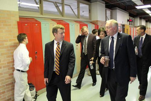 Principal Steve Straessle (left) leads the Jones family on a tour of Catholic High School. Thus far, funds from the capital campaign have paid for new windows, practice field and track. Dwain Hebda photo