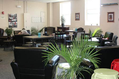Changes have already happened at Jericho Way. Where there used to be long, white plastic tables in the main room now sit stylish small black tables and comfortable chairs. (Aprille Hanson)