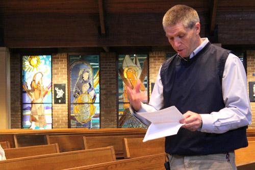 Deacon John Hall delivers a guided meditation, "Transitions in Family Life" during a 24-hour vigil, conducted by Our Lady of the Holy Souls Church in Little Rock. (Dwain Hebda photo)