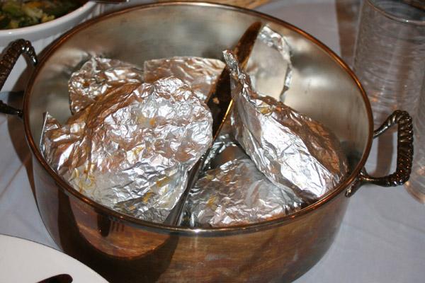 Though not required, Jennifer said a piece of foil can line the bottom of the pot to ensure the moi moi packets do not accidentally burn. Then place the packets in the pot of boiling water and simmer for 45 minutes. Water can be added to the pot as needed. After 45 minutes, remove from the water and cool for 20 minutes. (Aprille Hanson photo)
